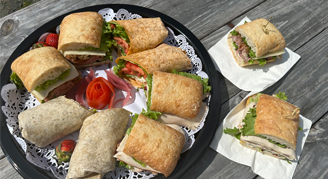 Platter of sandwiches on a table