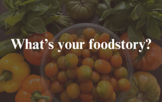 The words "what's your foodstory?" on a faded food background image