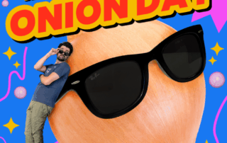 Person next to giant onion, both wearing sunglasses, on colorful 80s-looking background