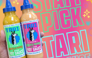 Two bottles of Tari Hot Sauce on colorful background with stars