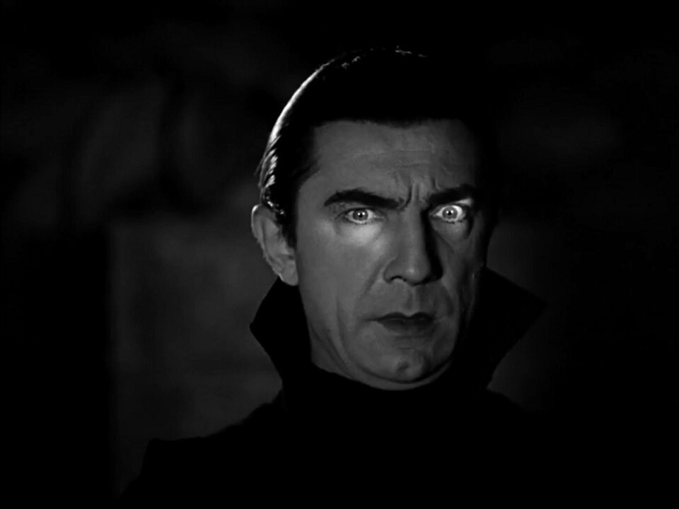 Bela_lugosi_dracula Bela Legosi as Dracula with light across his eyes. Public domain