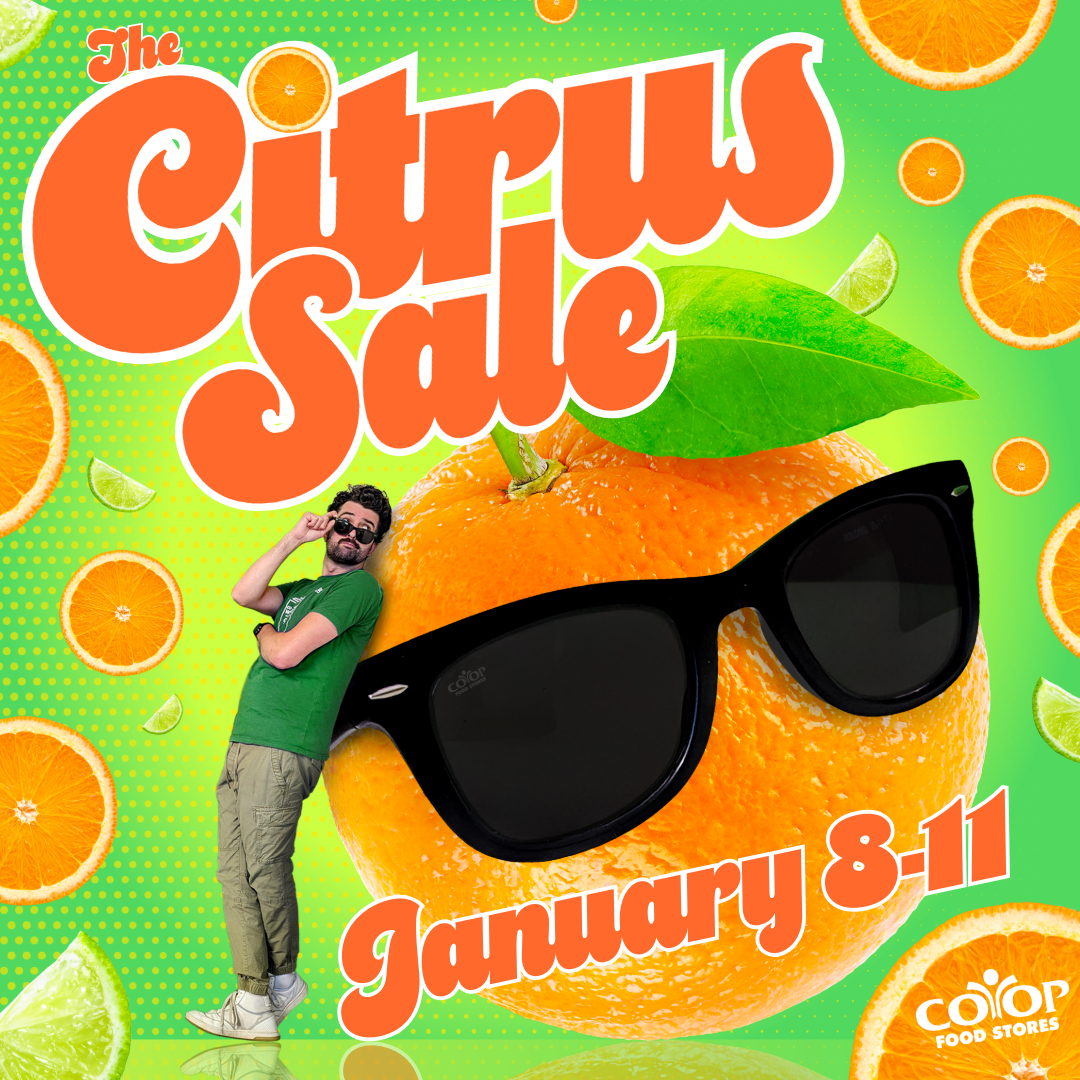 Photo illustration of Co-op employee leaning against a giant orange wearing sunglasses, all on a colorful background with sliced fruit. Yes I'm serious.