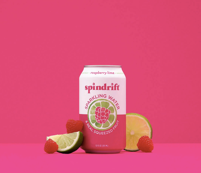 spindrift_raspberry_lime Photo of a can of Spindrift raspberry lime sparkling water on a red and pink background