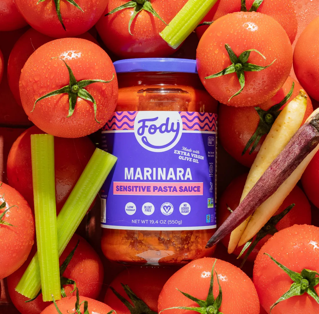 Photo of Fody Foods Marinara in jar with tomatoes and celery