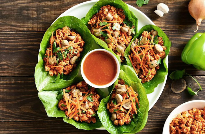 Photo of Pork Lettuce Wraps on wooden table